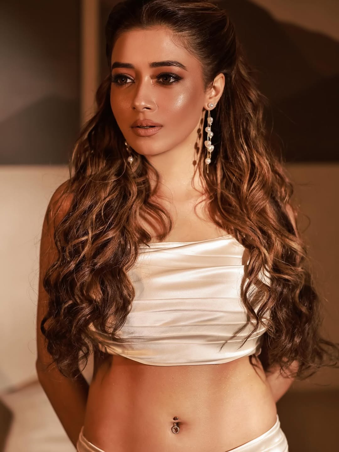 Tina Datta carrying satin outfit with confidence