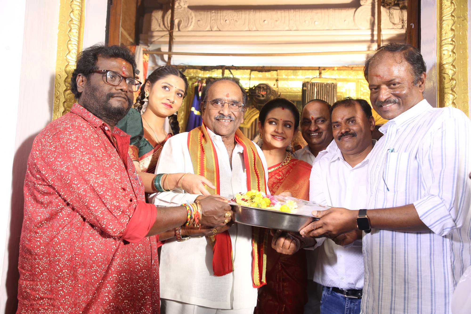 Film team performing opening rituals