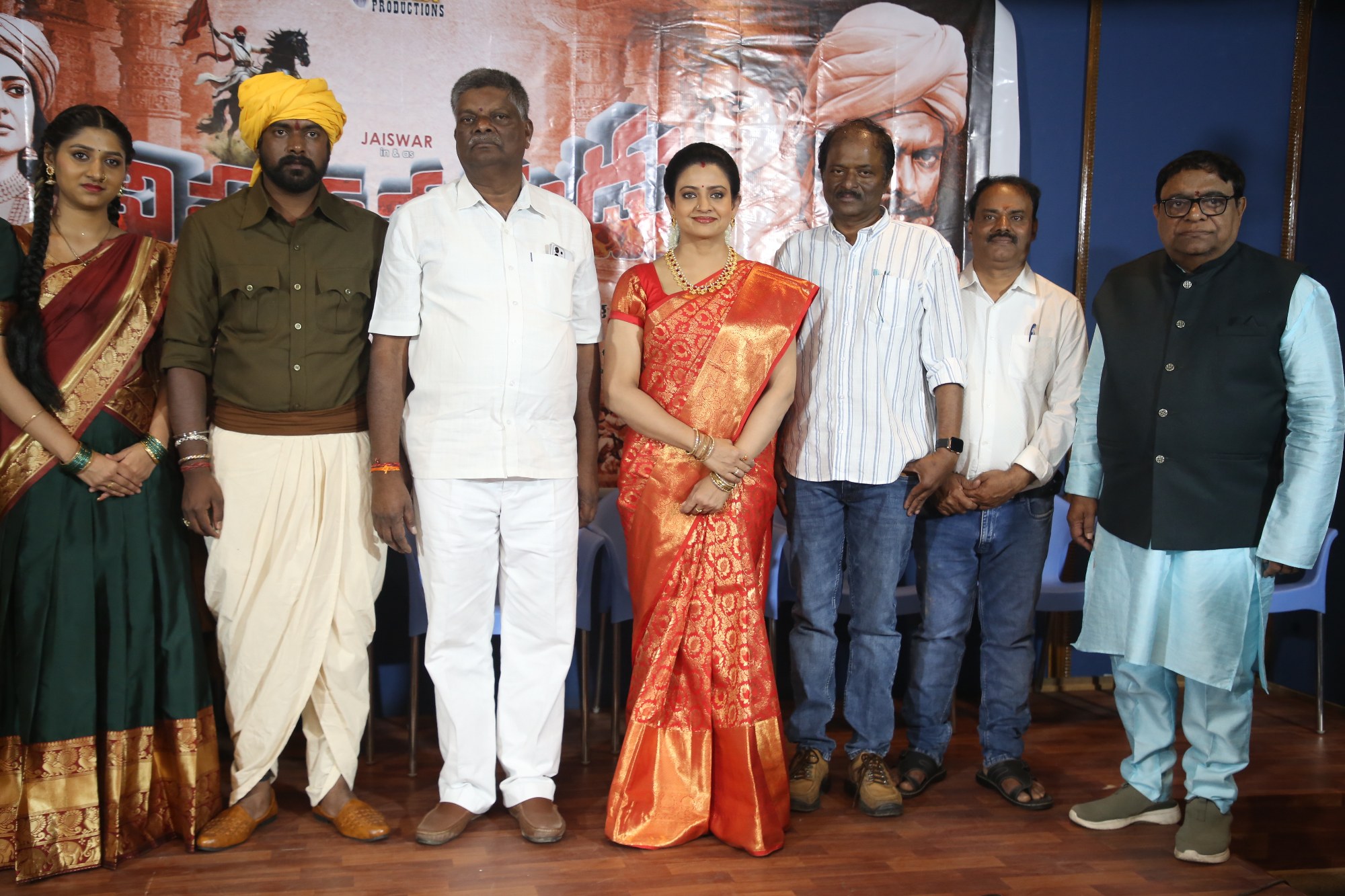 Actors celebrating movie launch