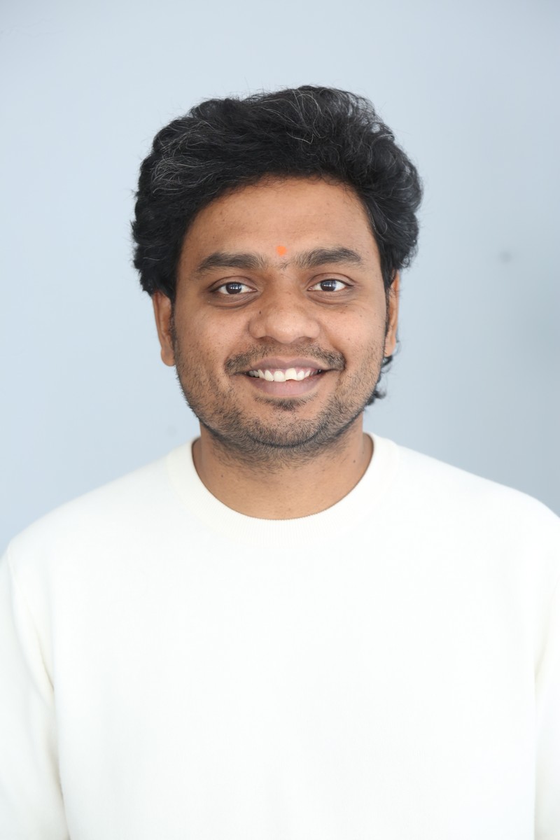 Abhilash Reddy sharp outfit with stylish smile and charm