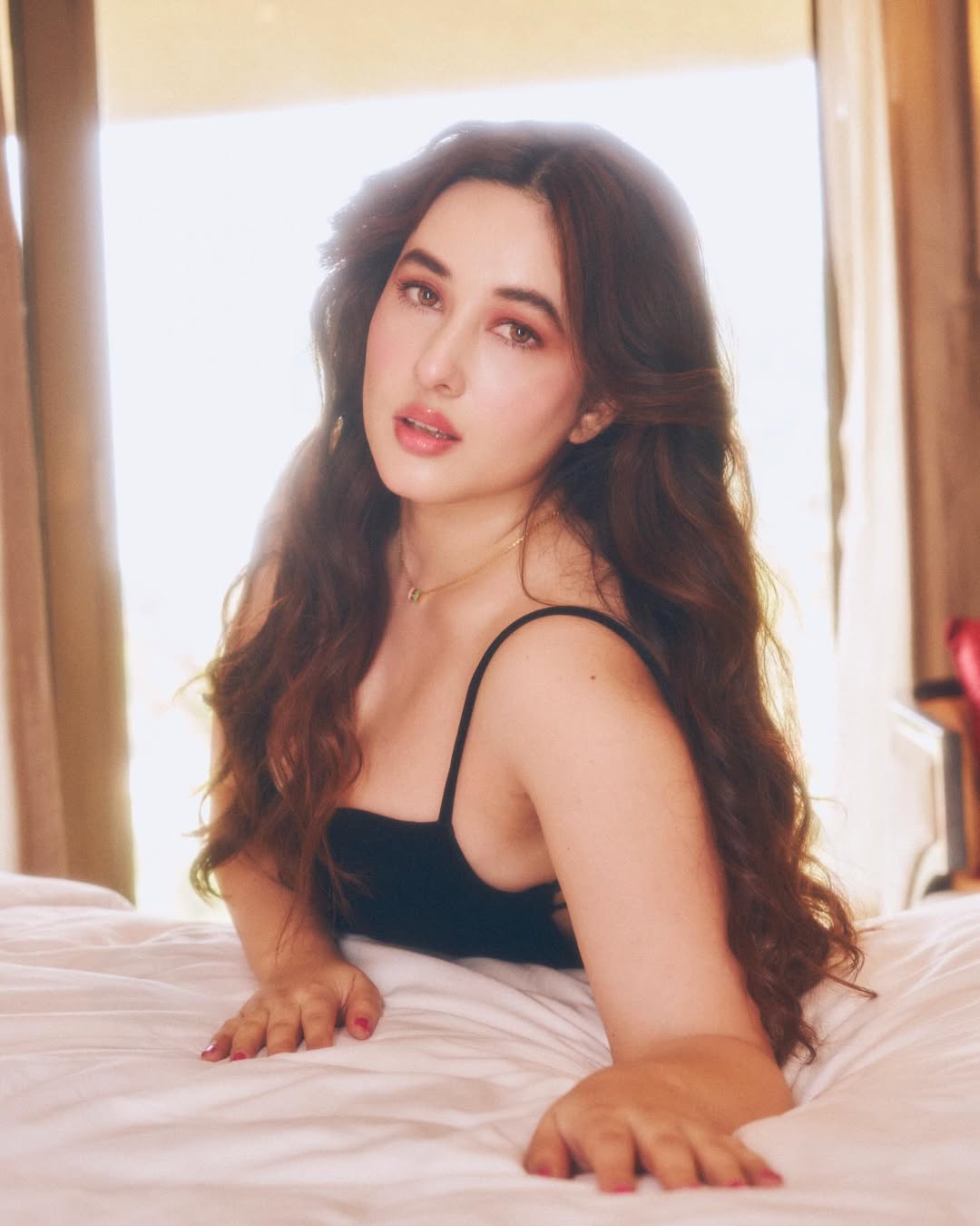 Aditi Budhathoki stylish black dress fashion pose