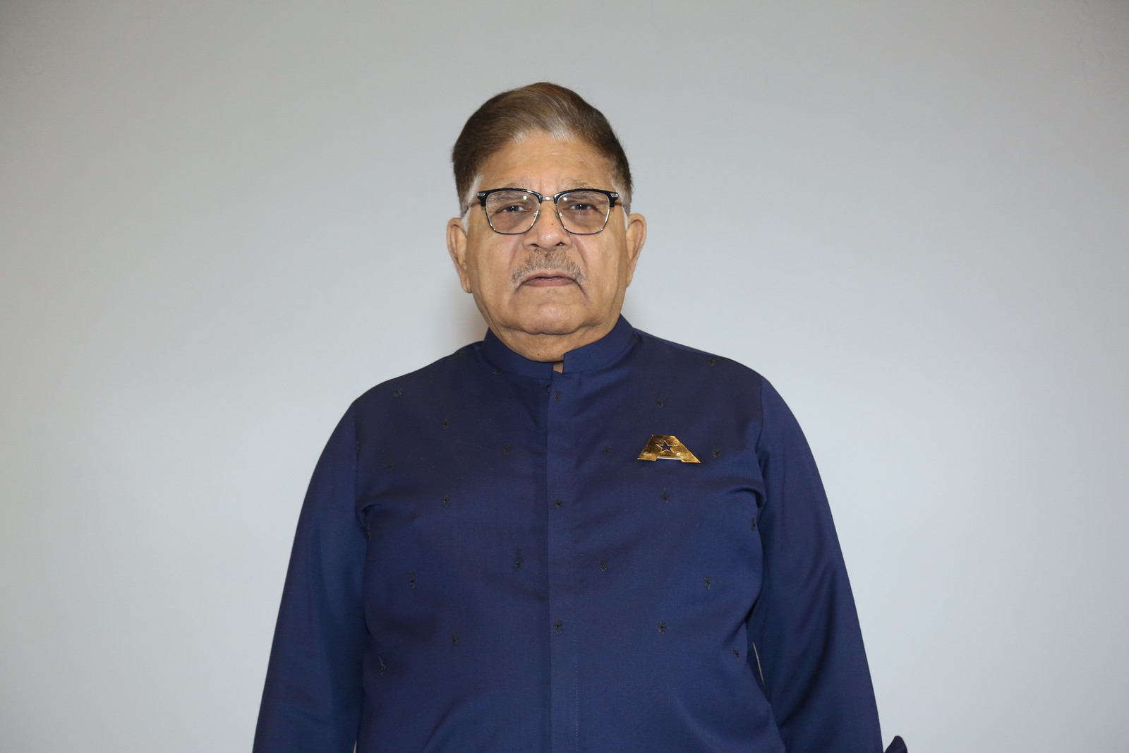 Allu Aravind posing at Allu Cinemas event