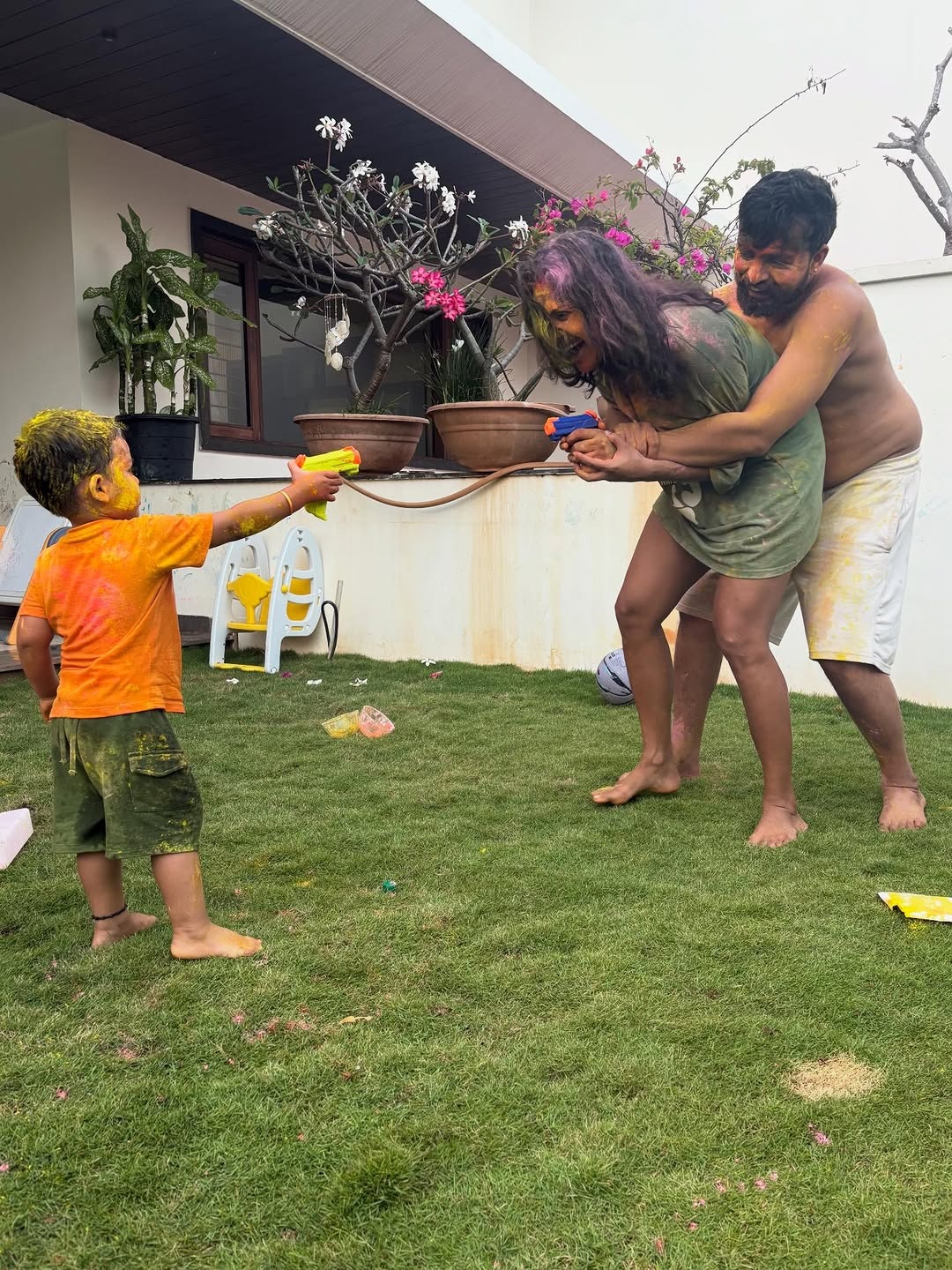 Amala Paul Celebrates Holi with Husband Jagat Desai and Son; Photos Go Viral