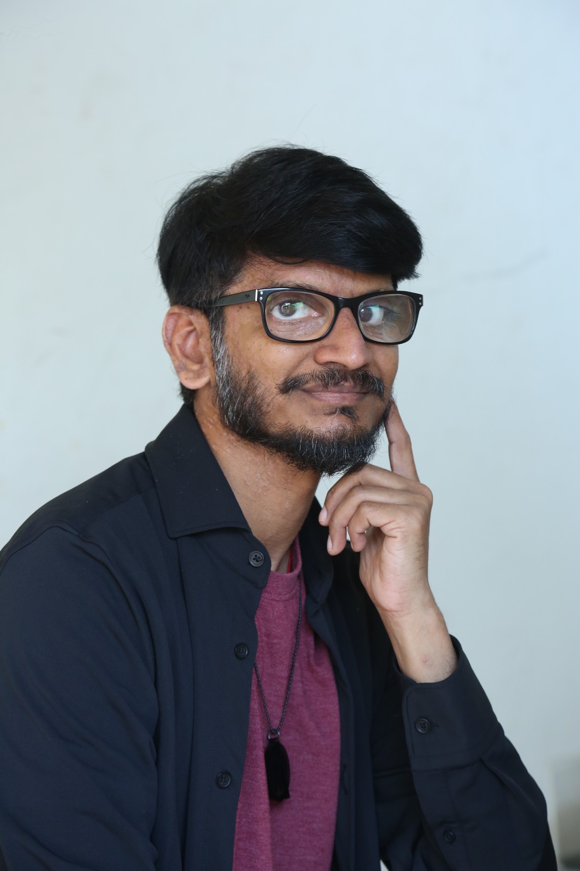 Ananth Sriram sharp attire portrait with confident personality