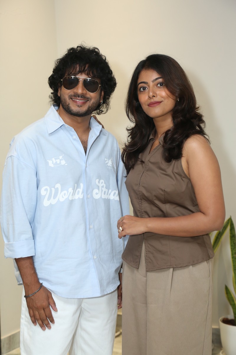 Rag Mayur Merin Philip posing at press meet