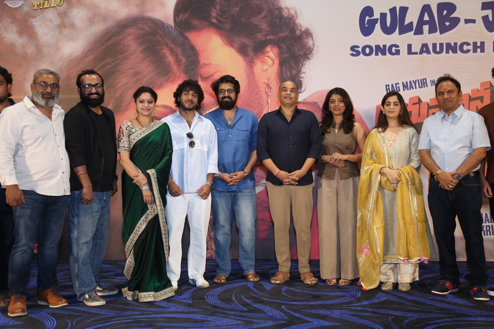 Film team group pose at song launch event