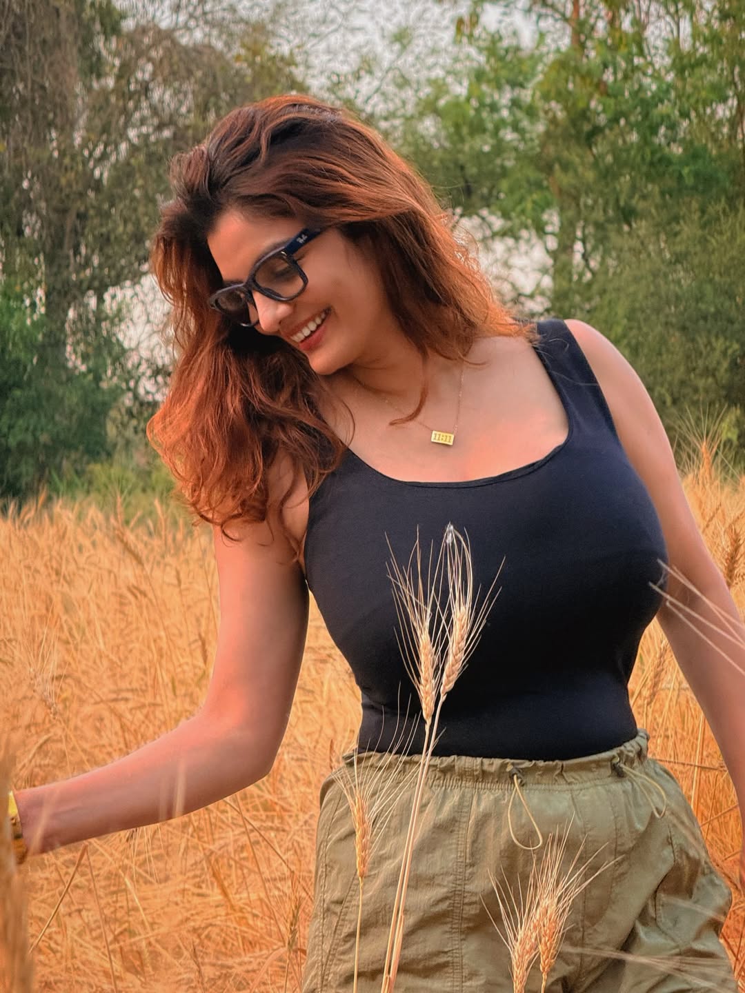 Anveshi Jain elegant earthy tone outfit in golden fields