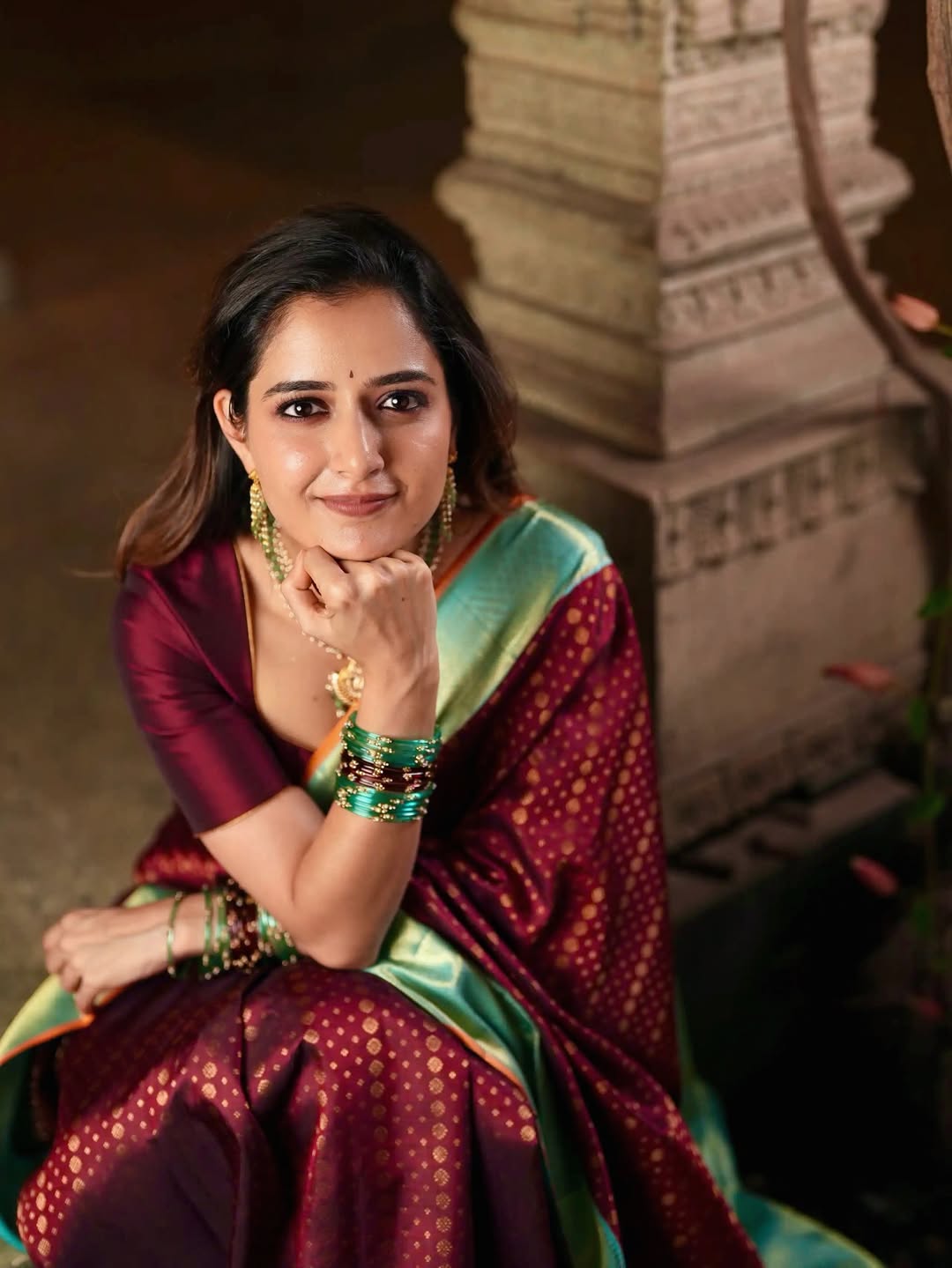 Ashika Ranganath elegant saree traditional chic confident pose