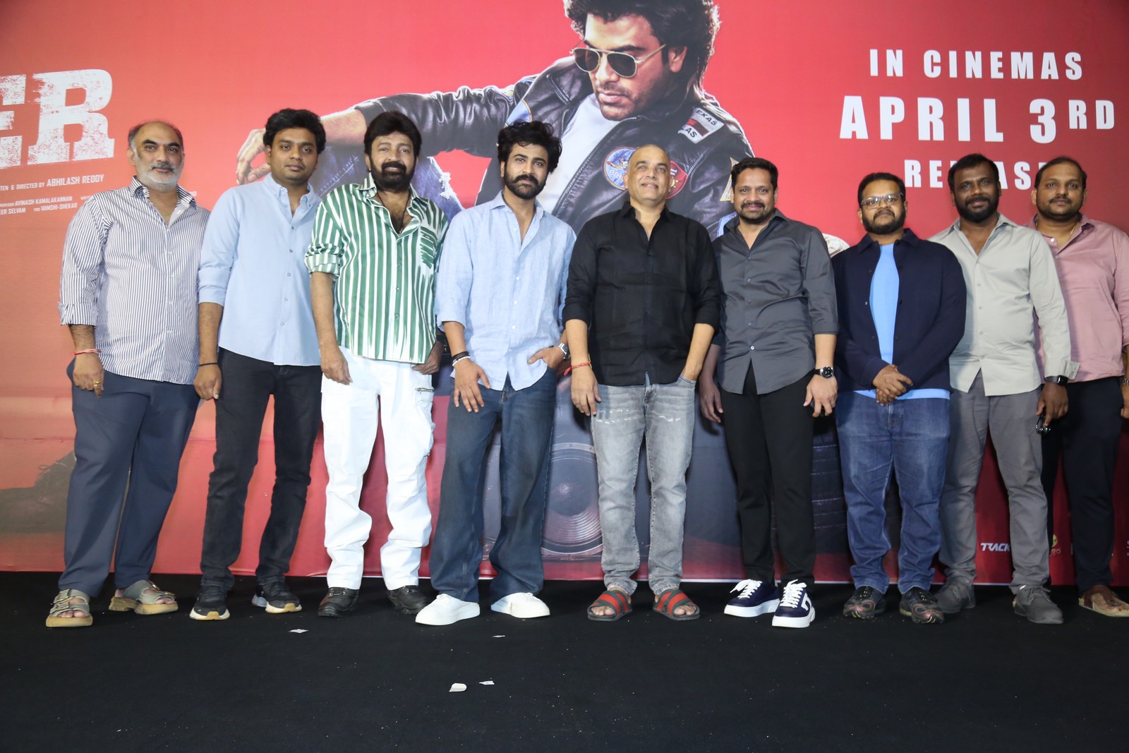 Biker team group pose at trailer launch