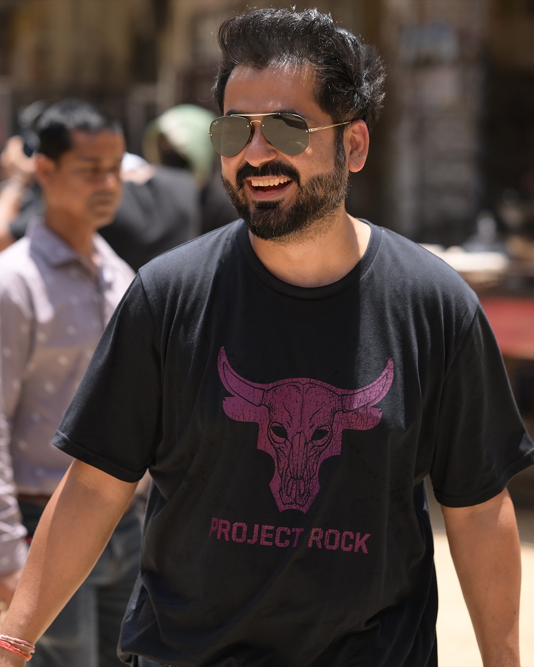 Aditya Dhar smiling behind the scenes on set