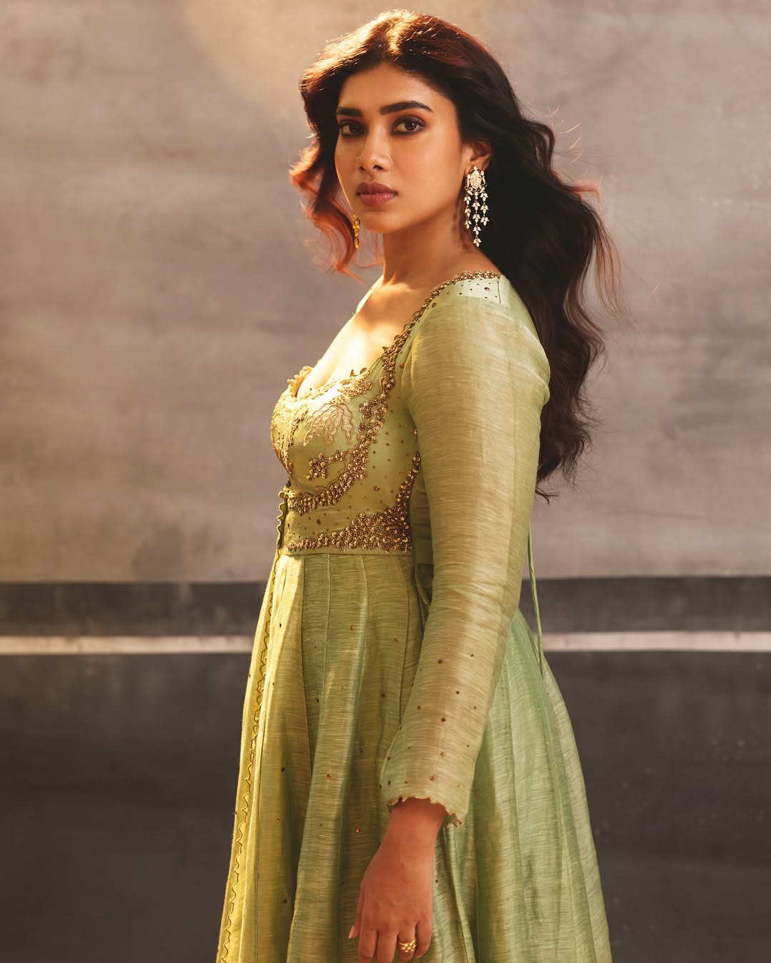 Dushara Vijayan regal green ensemble with graceful stylish pose