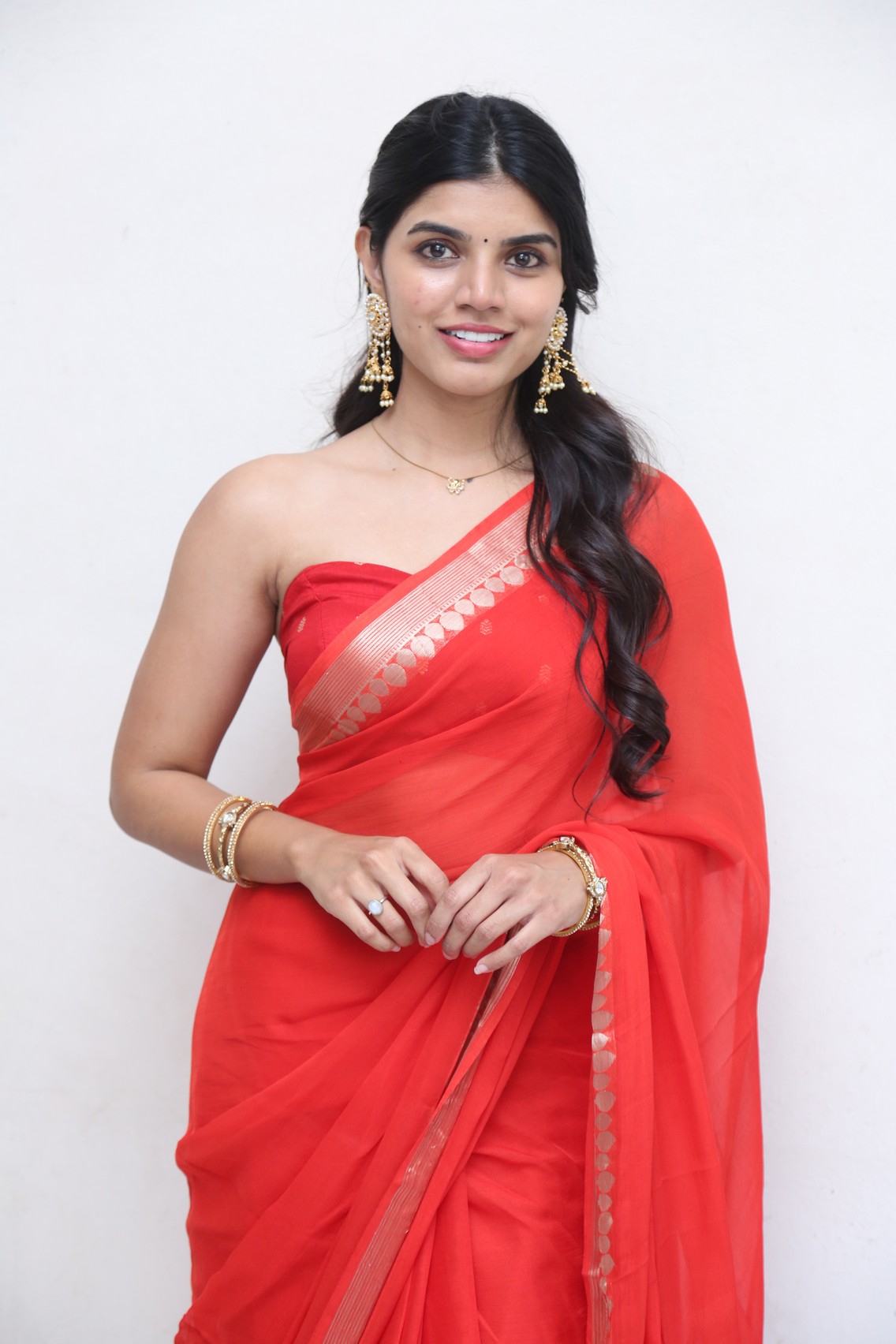 Gayathri Ramana stylish saree drape with elegant accessories