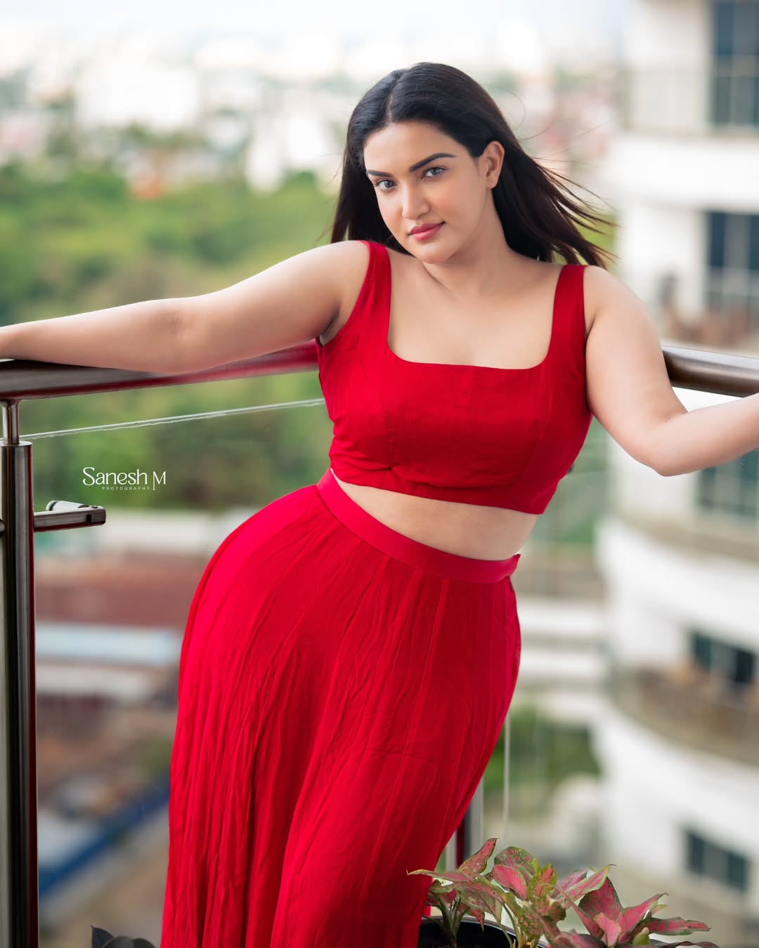 Honey Rose fierce red dress glamorous statement style