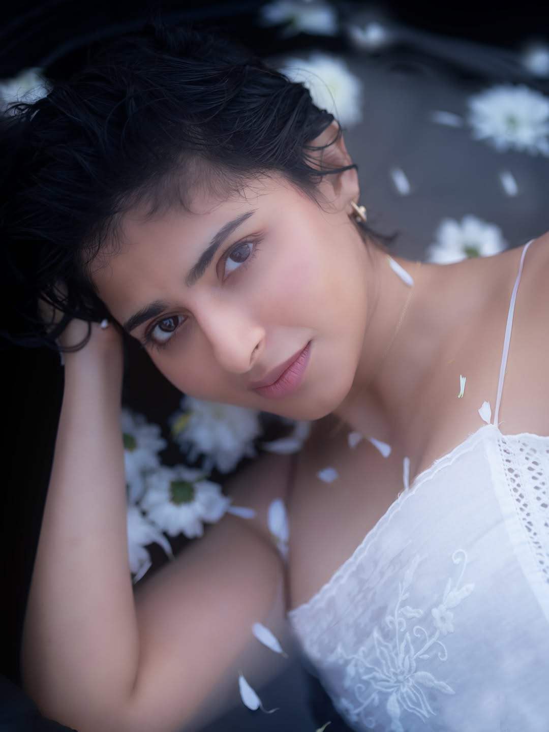 Iswarya Menon radiant smile serene poolside style