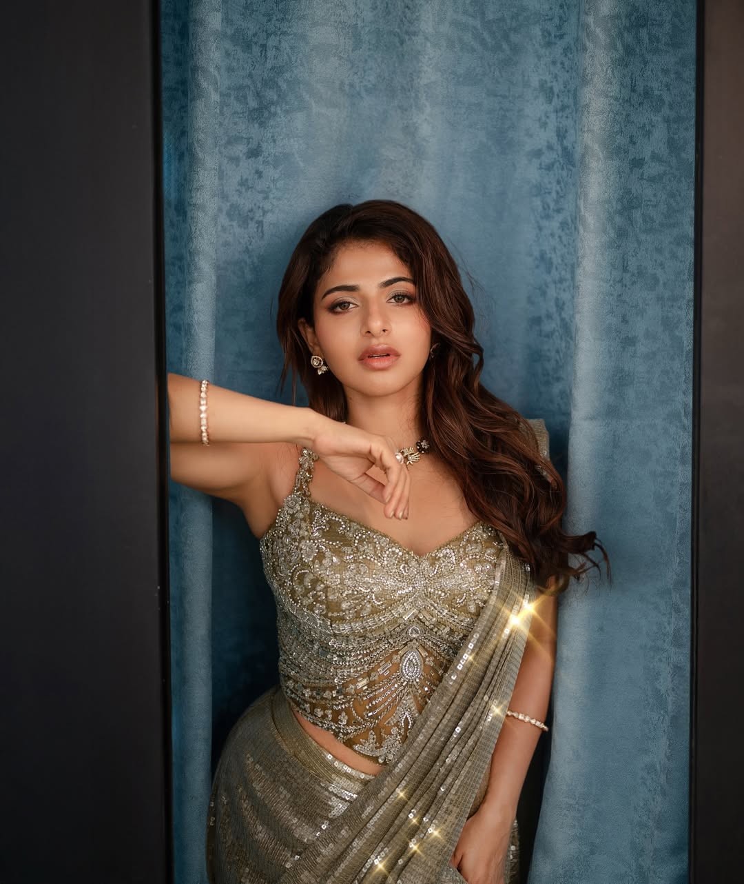 Iswarya Menon shimmering dress confident radiant elegant pose