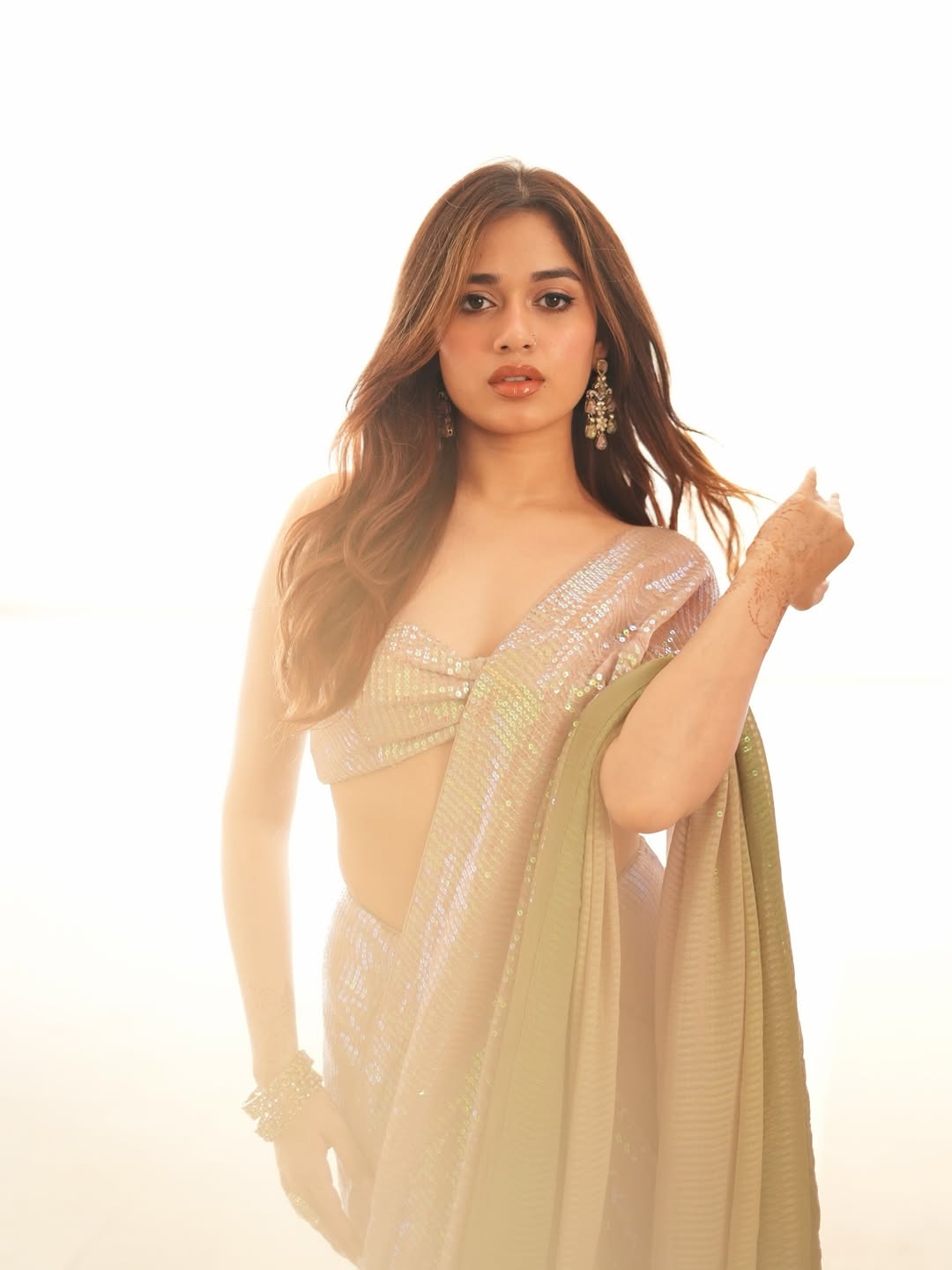 Jannat Zubair Rahmani stylish sparkling dress graceful pose