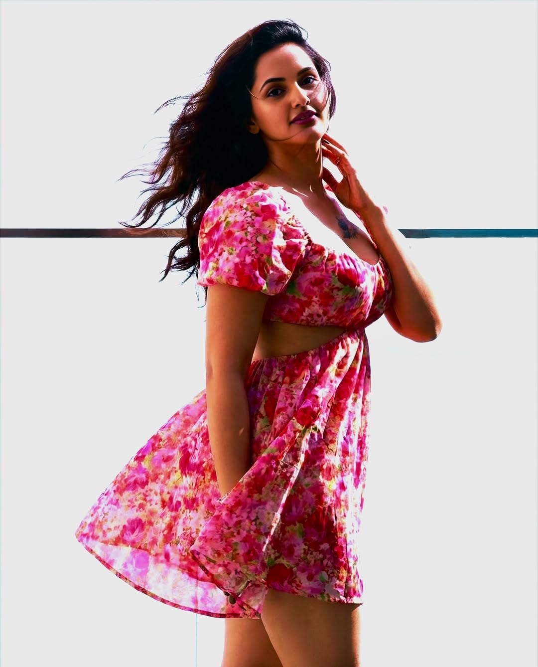Jyothi Rai breezy floral dress fashionable candid pose