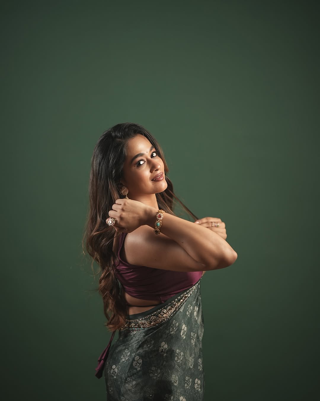 Kaavya Arivumani modern saree glam classy confident pose