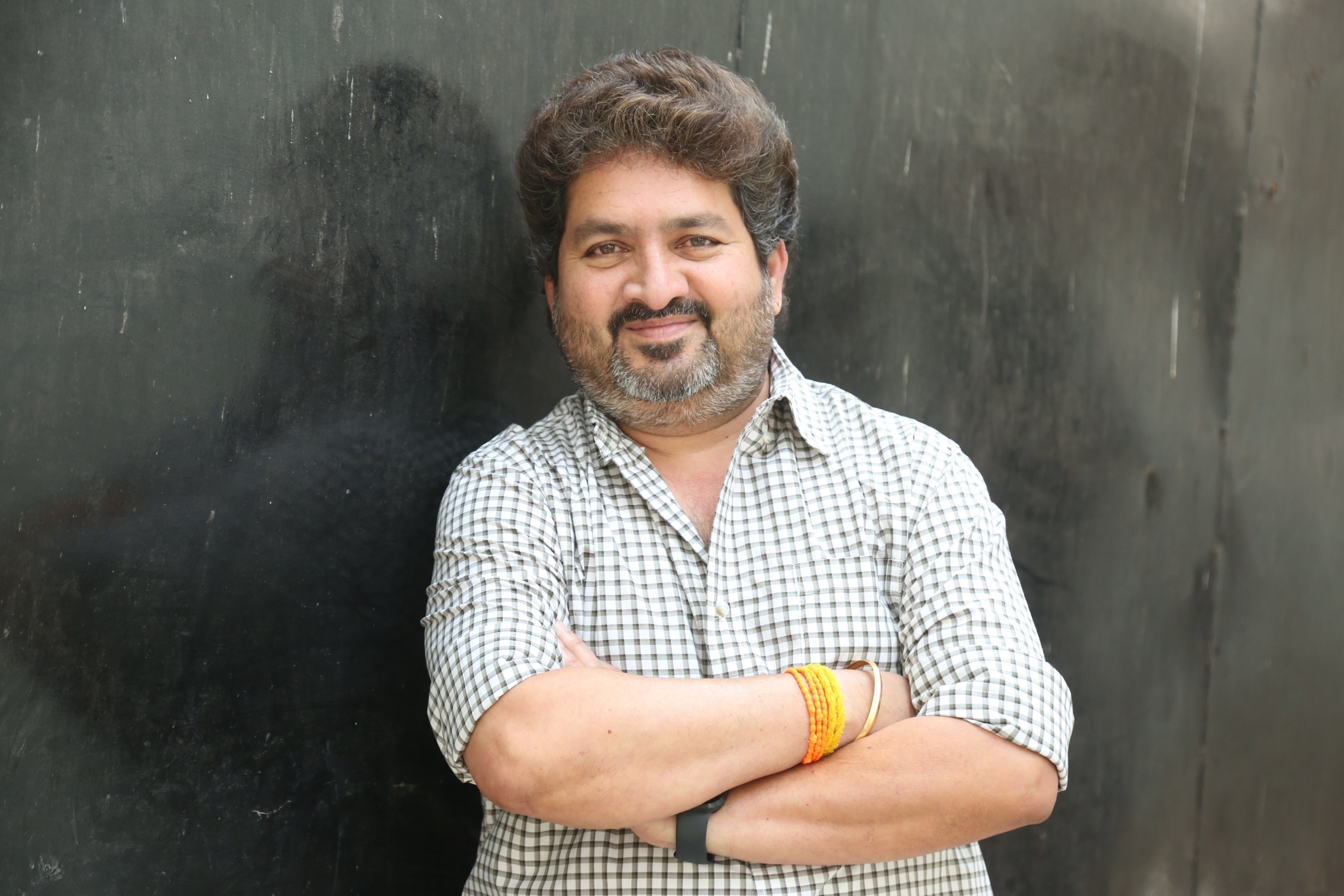 Kasarla Shyam stylish look in checkered shirt