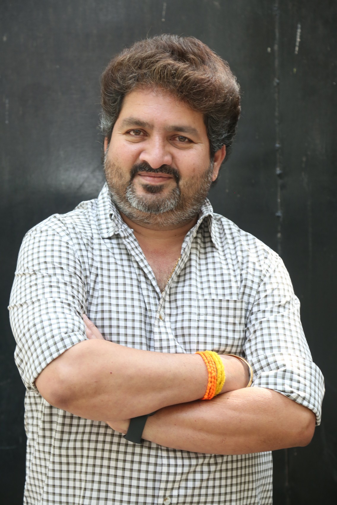 Kasarla Shyam casual style in checkered shirt