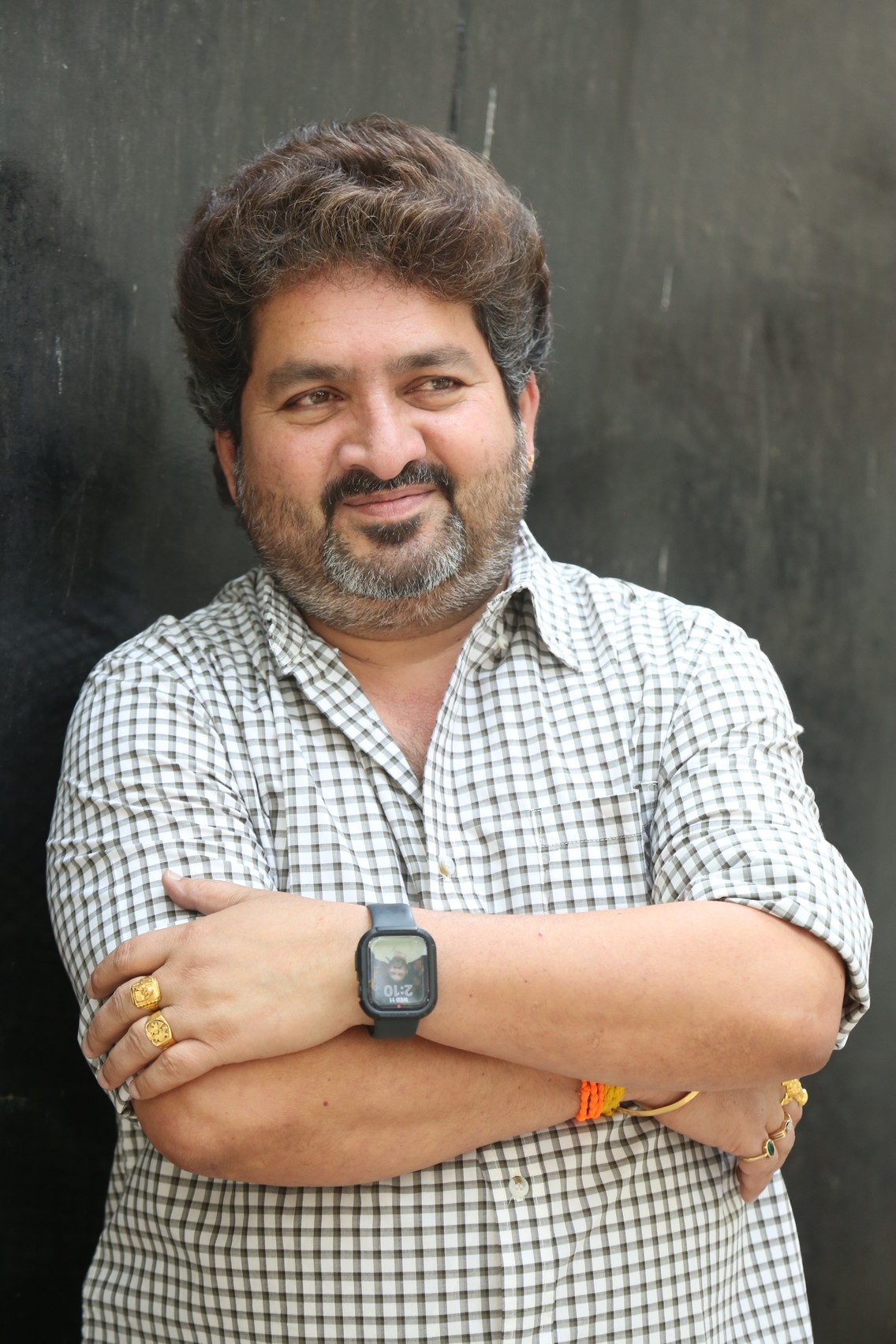 Kasarla Shyam stylish pose casual portrait