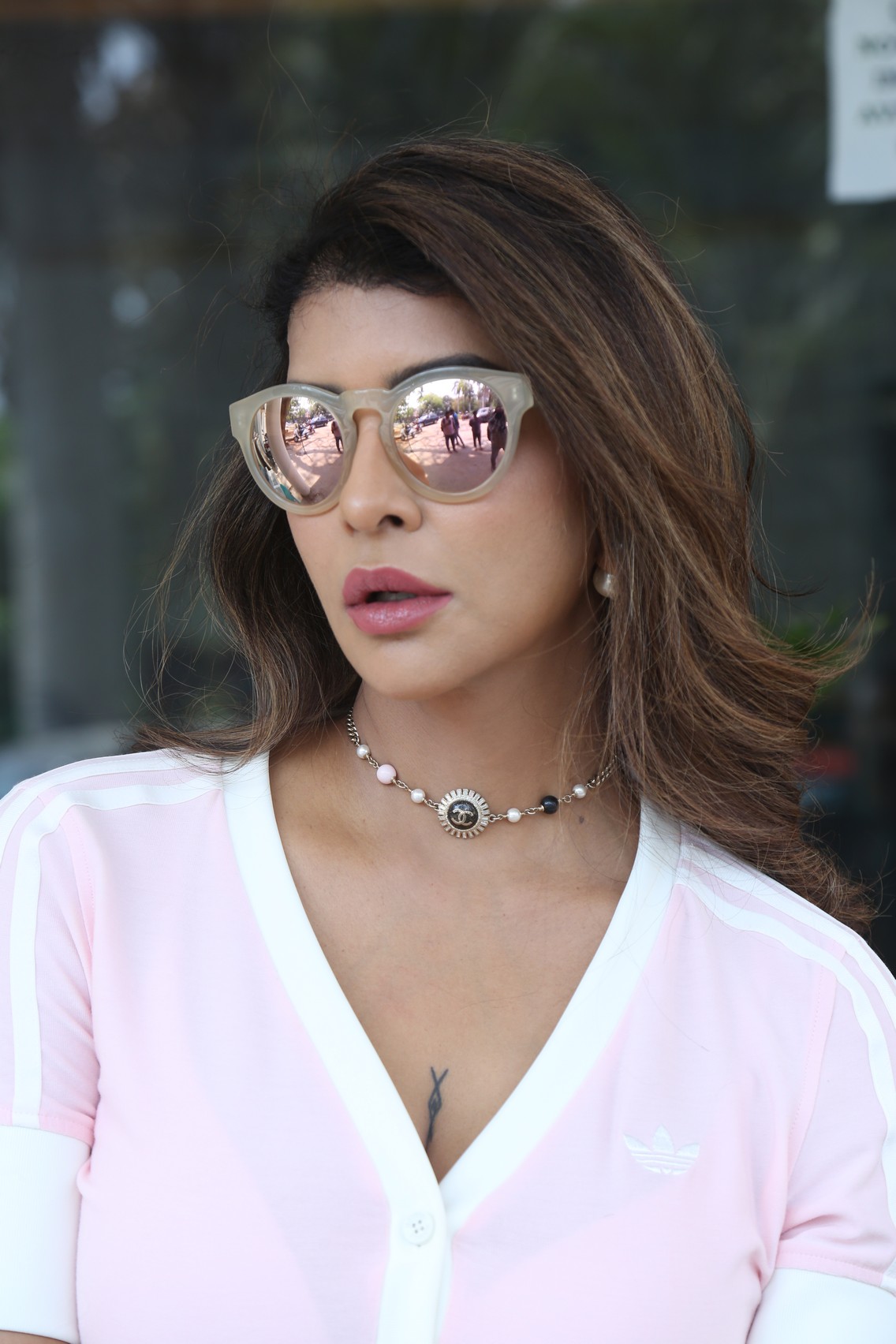 Lakshmi Manchu chic outfit with stylish sunglasses and necklace