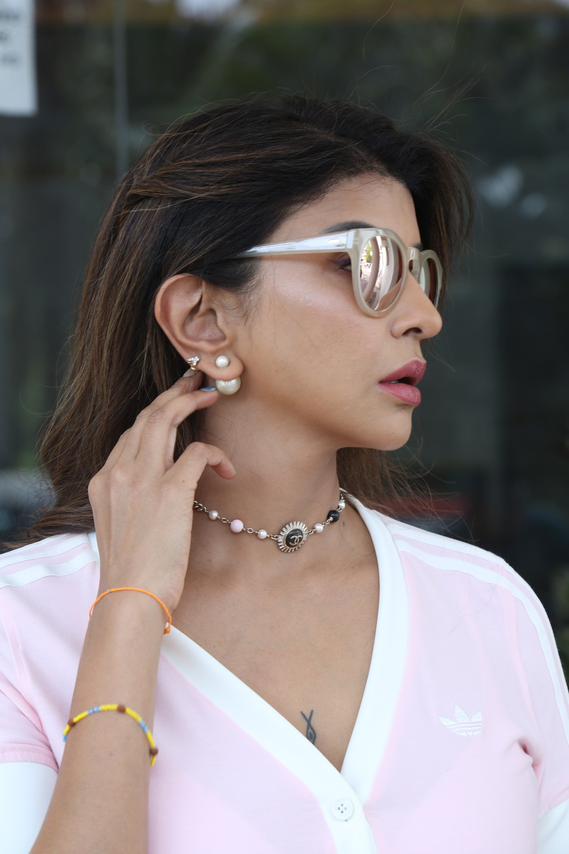 Lakshmi Manchu stylish look with reflective shades and pearl accessories