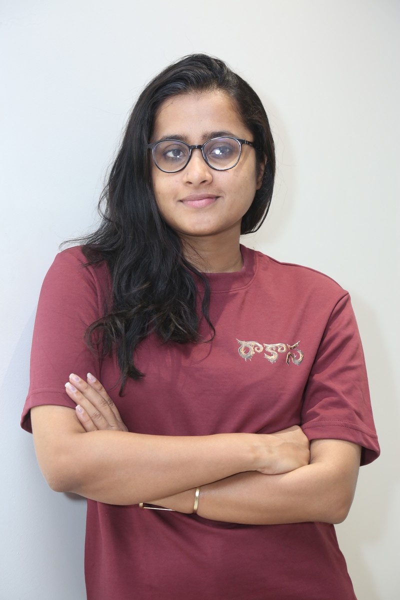 Manasa Sharma stylish look with glasses confident pose