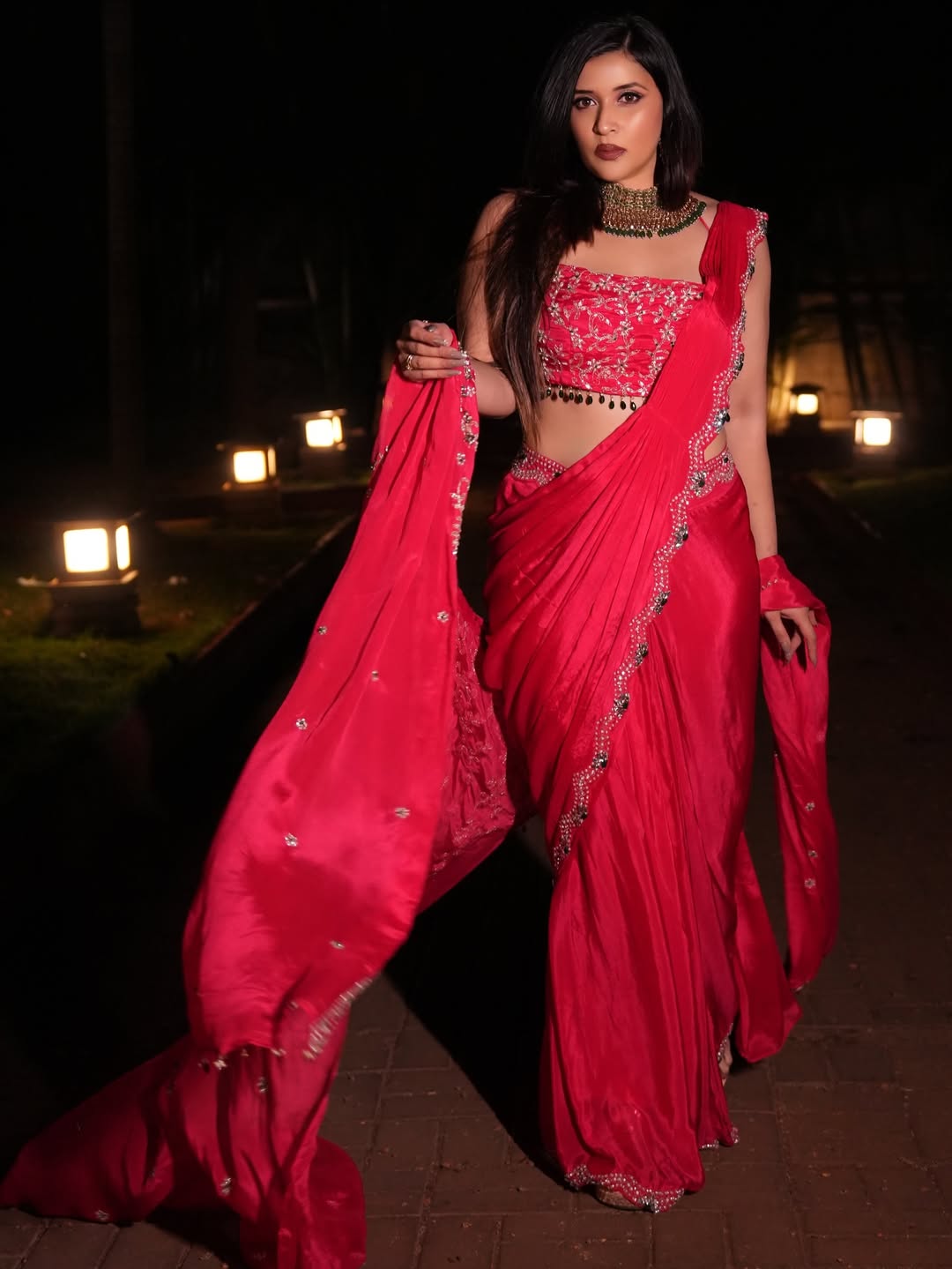 Mannara Chopra vibrant pink saree elegant stylish pose