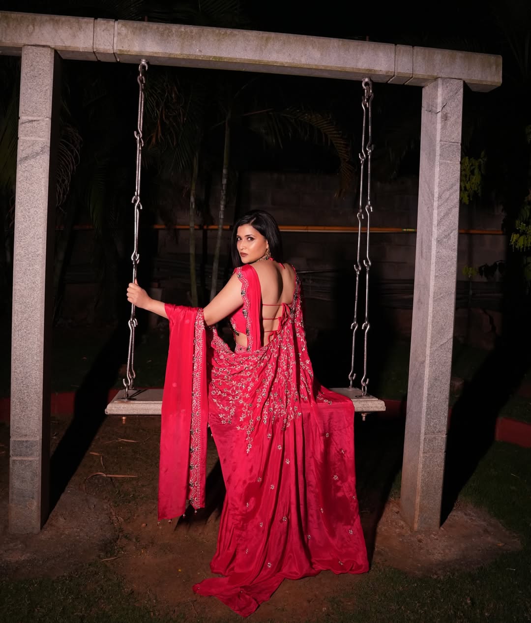 Mannara Chopra gorgeous red traditional ensemble stylish pose