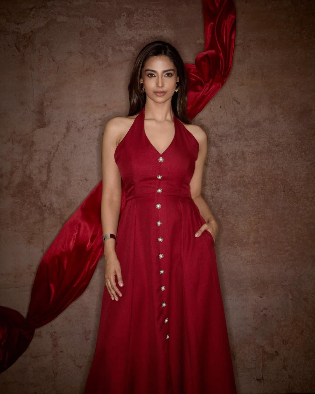 Meenakshi Chaudhary elegant red outfit fashion portrait