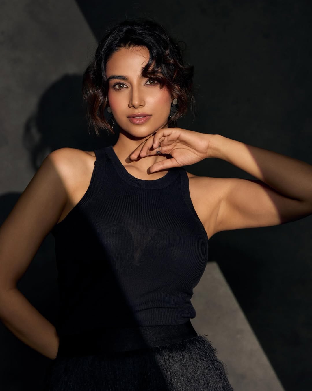 Meenakshi Chaudhary sleek black ensemble chic style