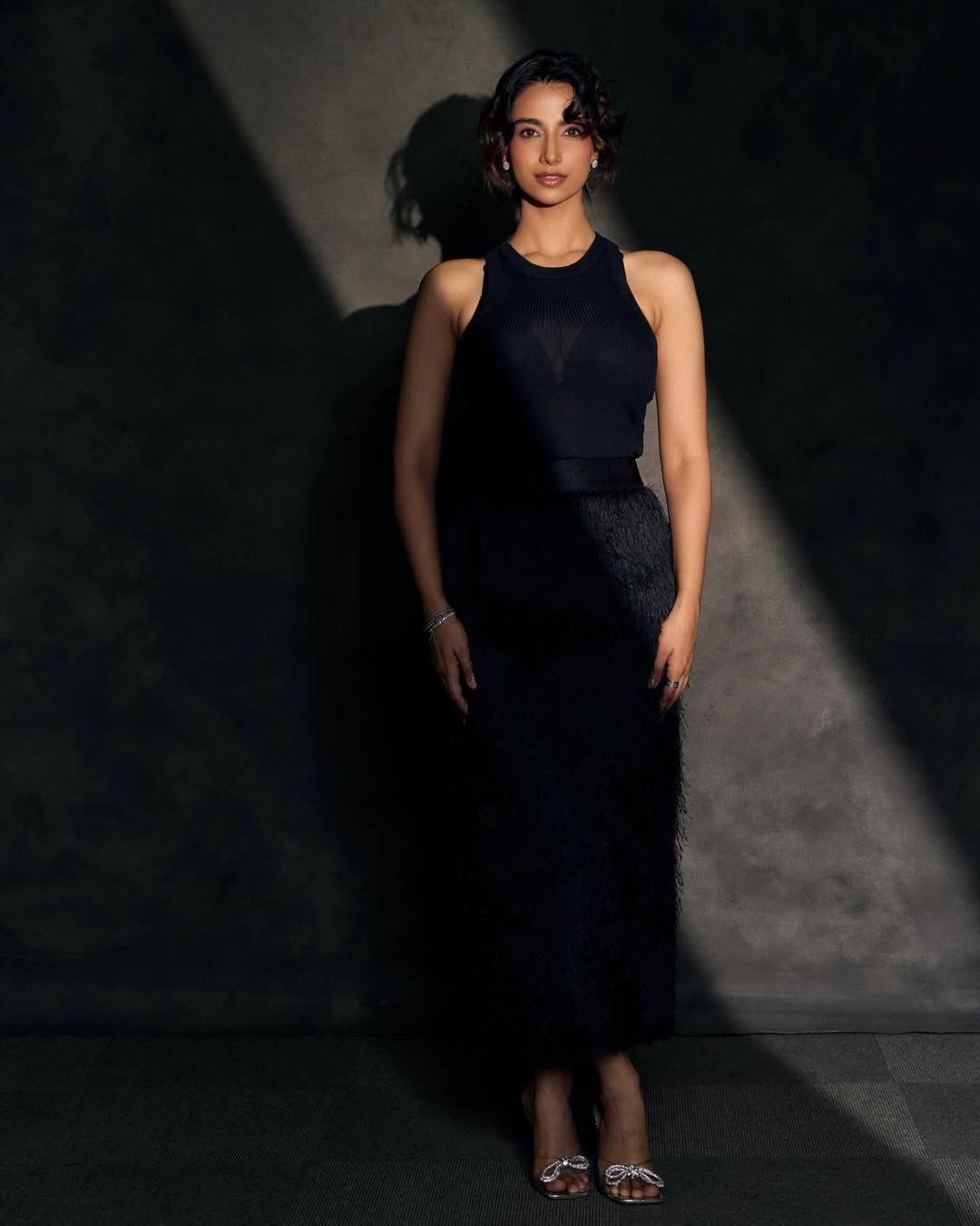 Meenakshi Chaudhary sophisticated black ensemble confident style look