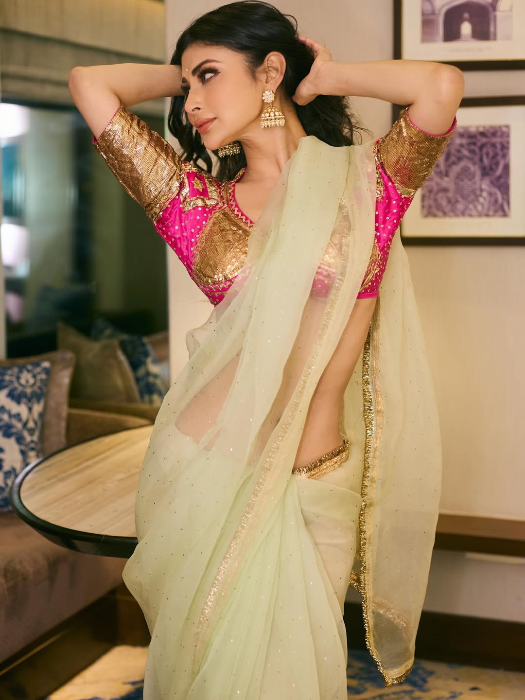 Mouni Roy elegant pastel yellow saree traditional glam look