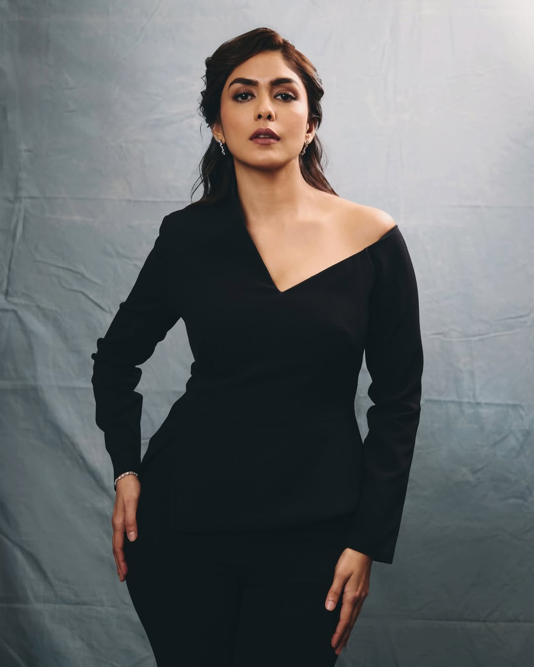Mrunal Thakur black dress chic elegant confident look