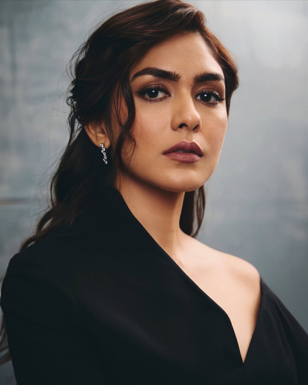 Mrunal Thakur fierce stare black outfit stylish pose