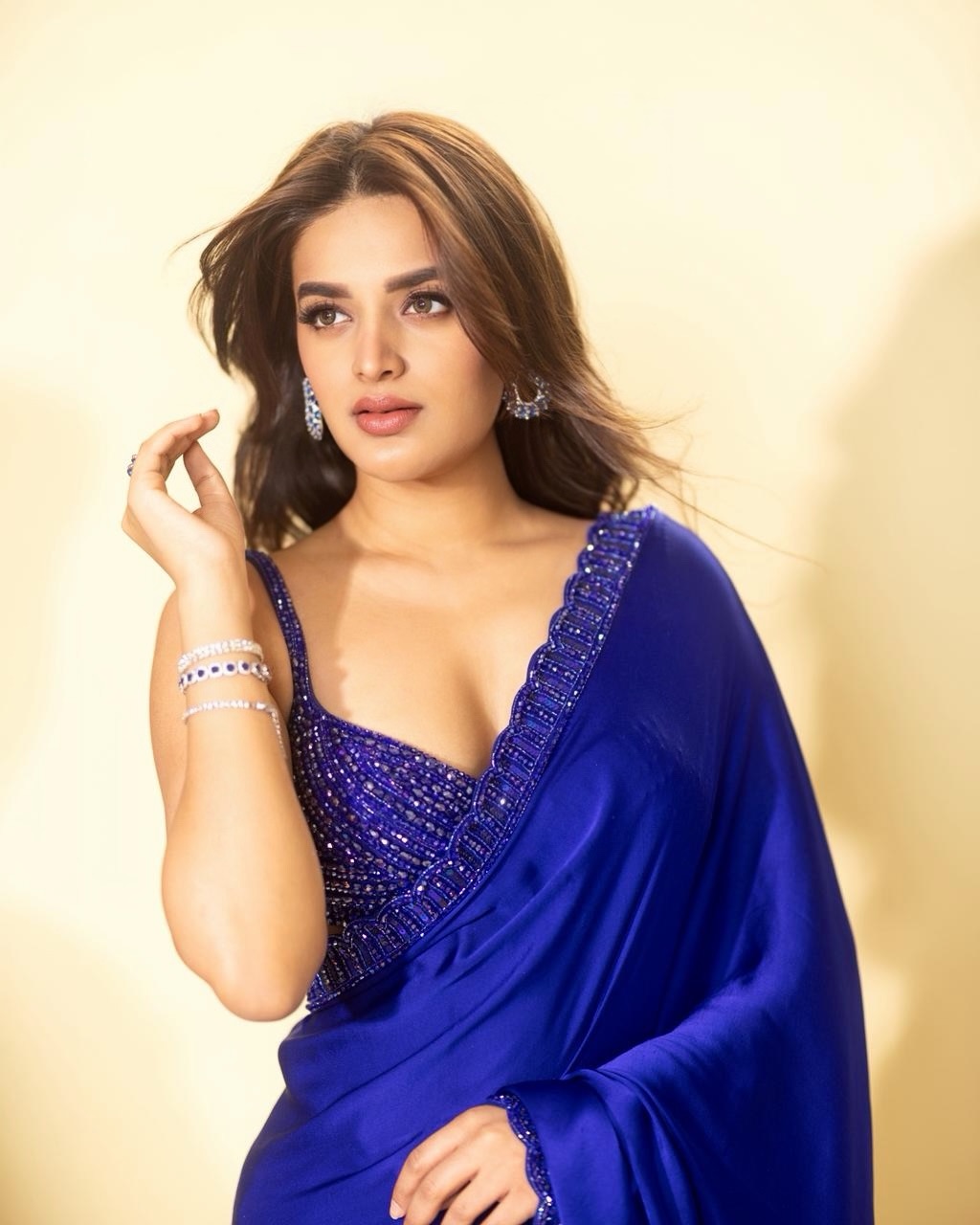 Nidhhi Agerwal royal blue outfit graceful pose