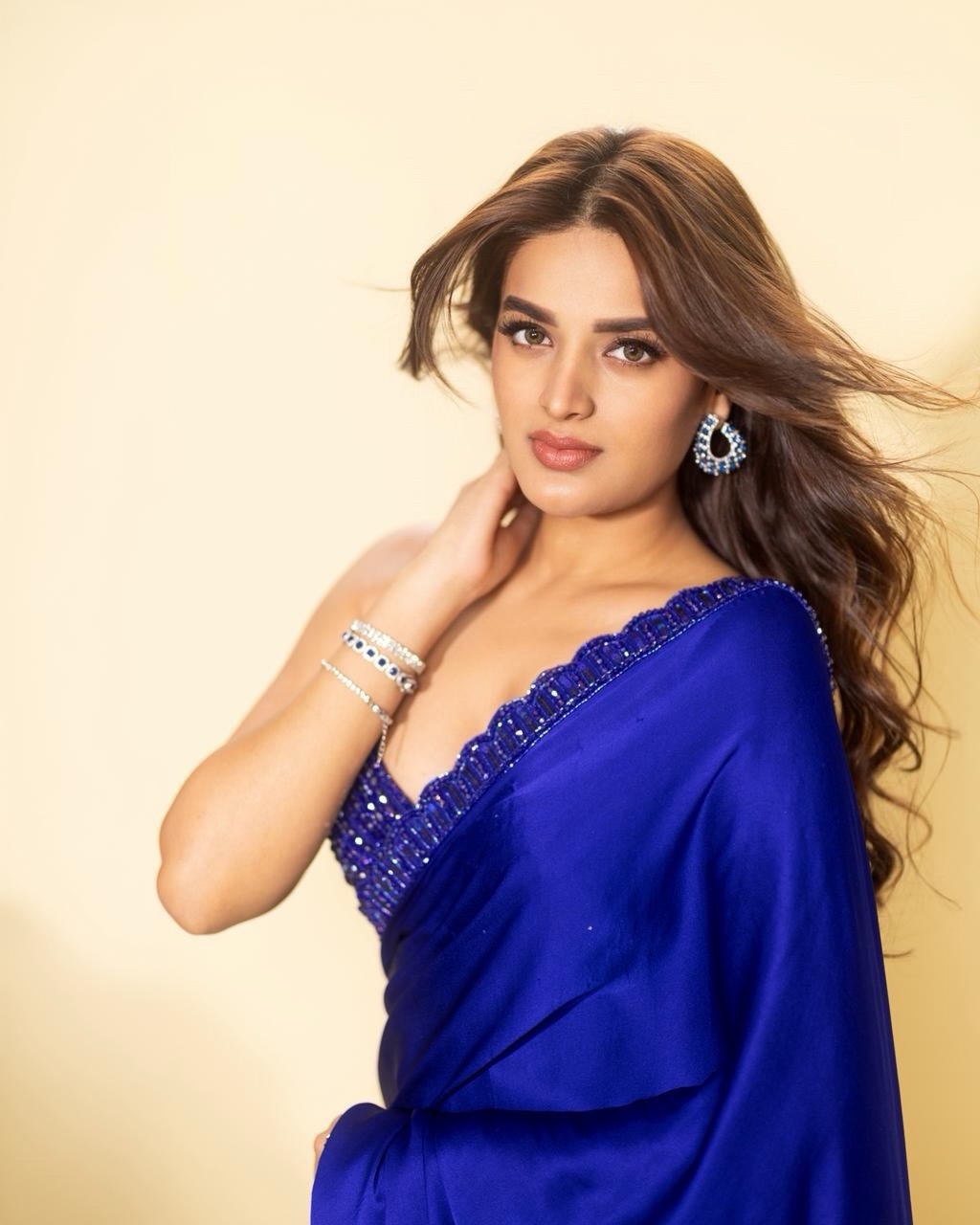 Nidhhi Agerwal blue ensemble sparkling elegant style