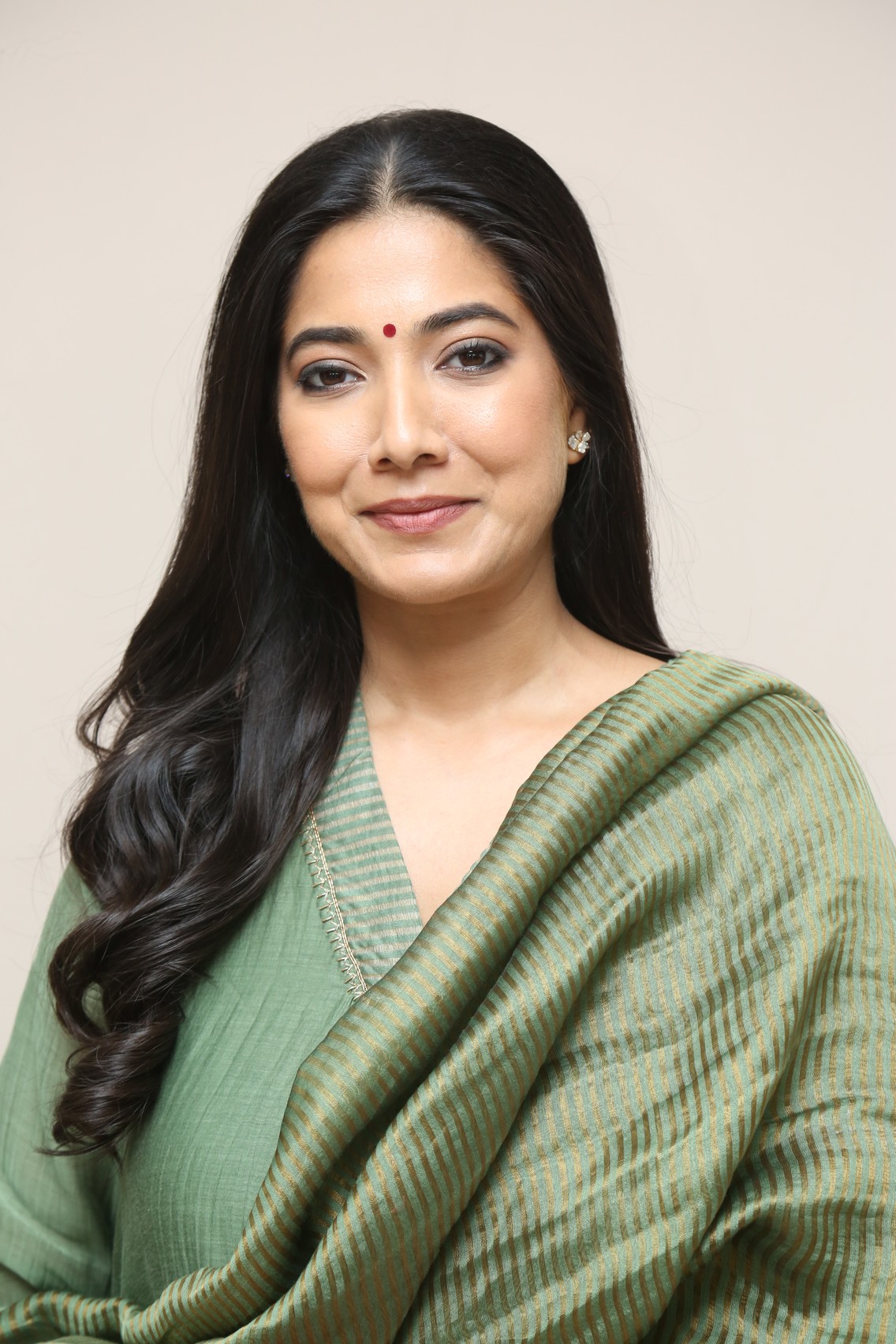 Pooja Sarathkumar elegant look with charming smile