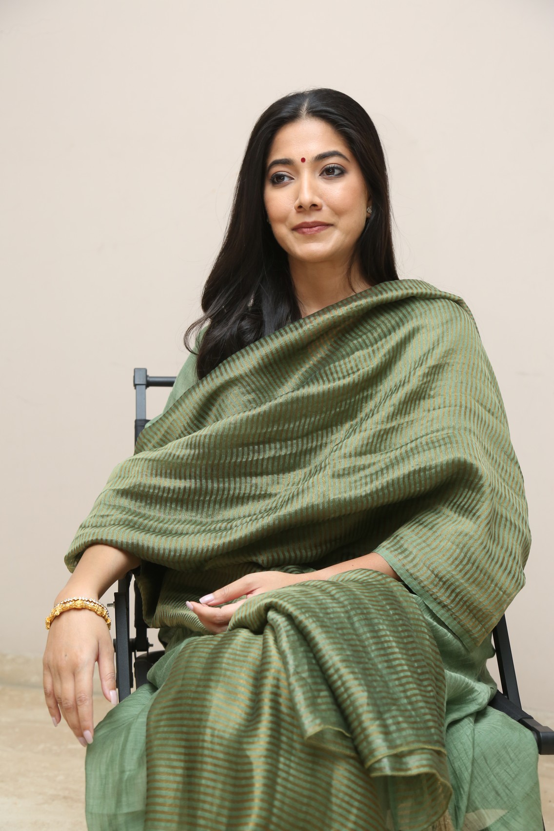 Pooja Sarathkumar classic green outfit confident presence