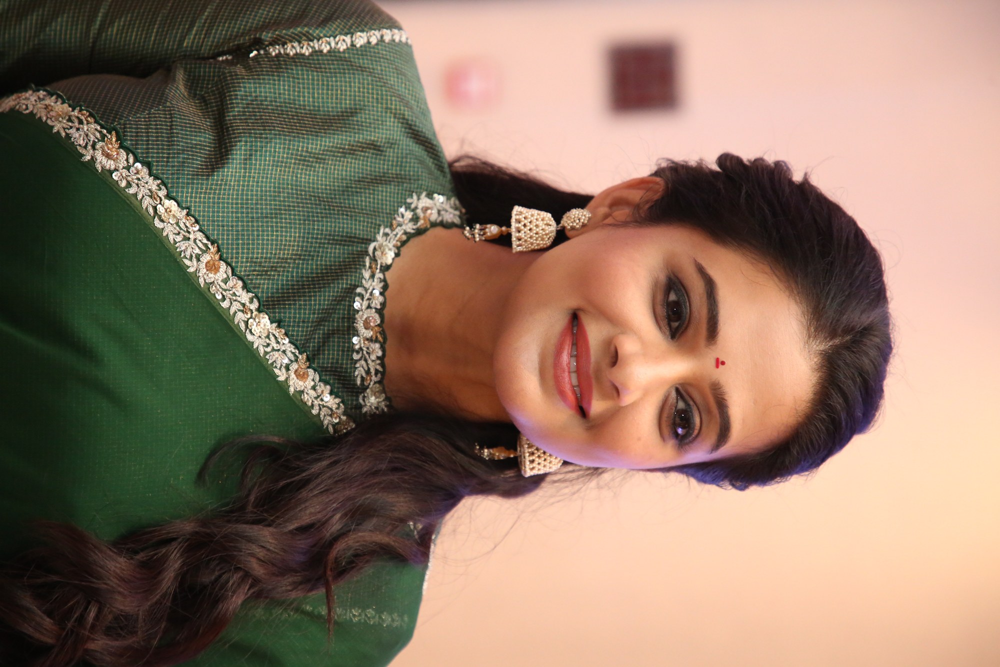 Priyamani in green saree with dazzling jewelry
