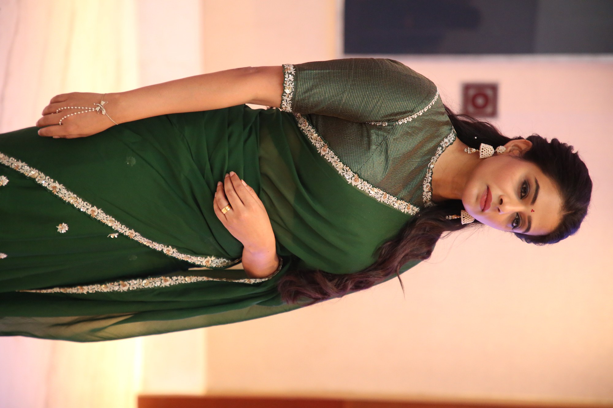Priyamani emerald green saree graceful appearance