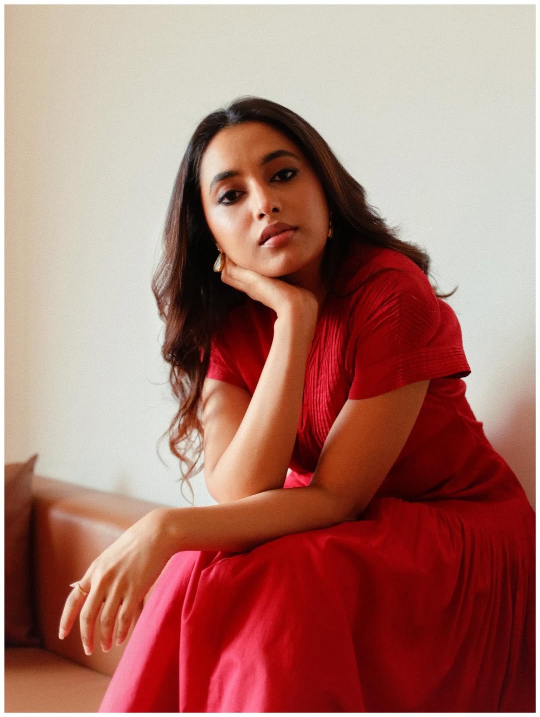 Priyanka Mohan regal red outfit with elegant presence