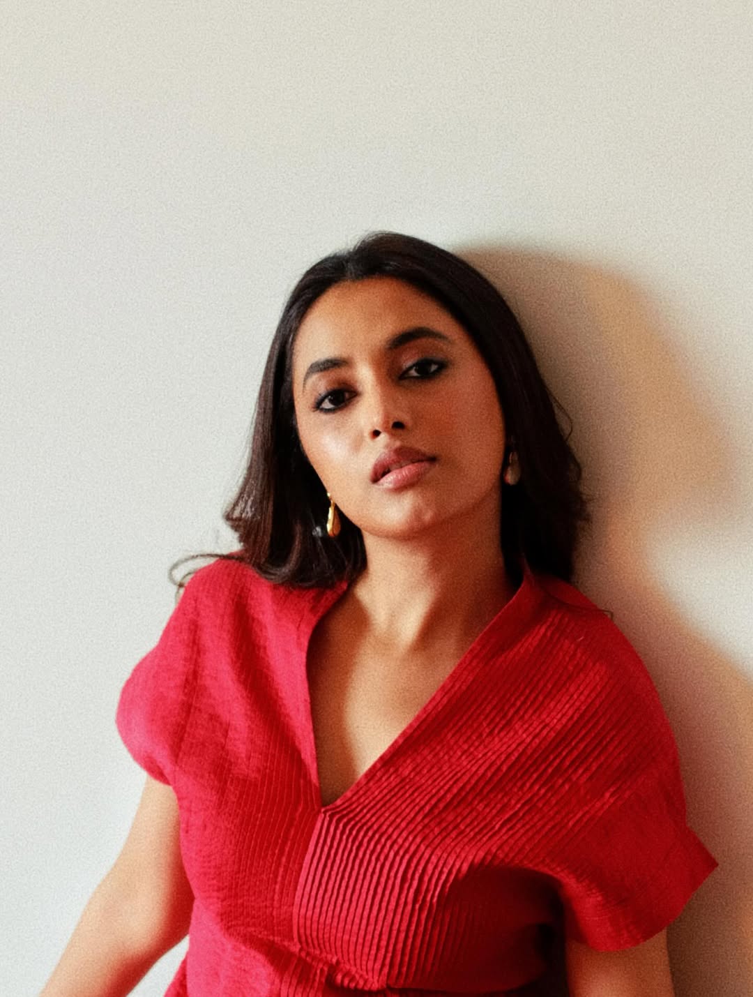 Priyanka Mohan bold red dress with confident runway style