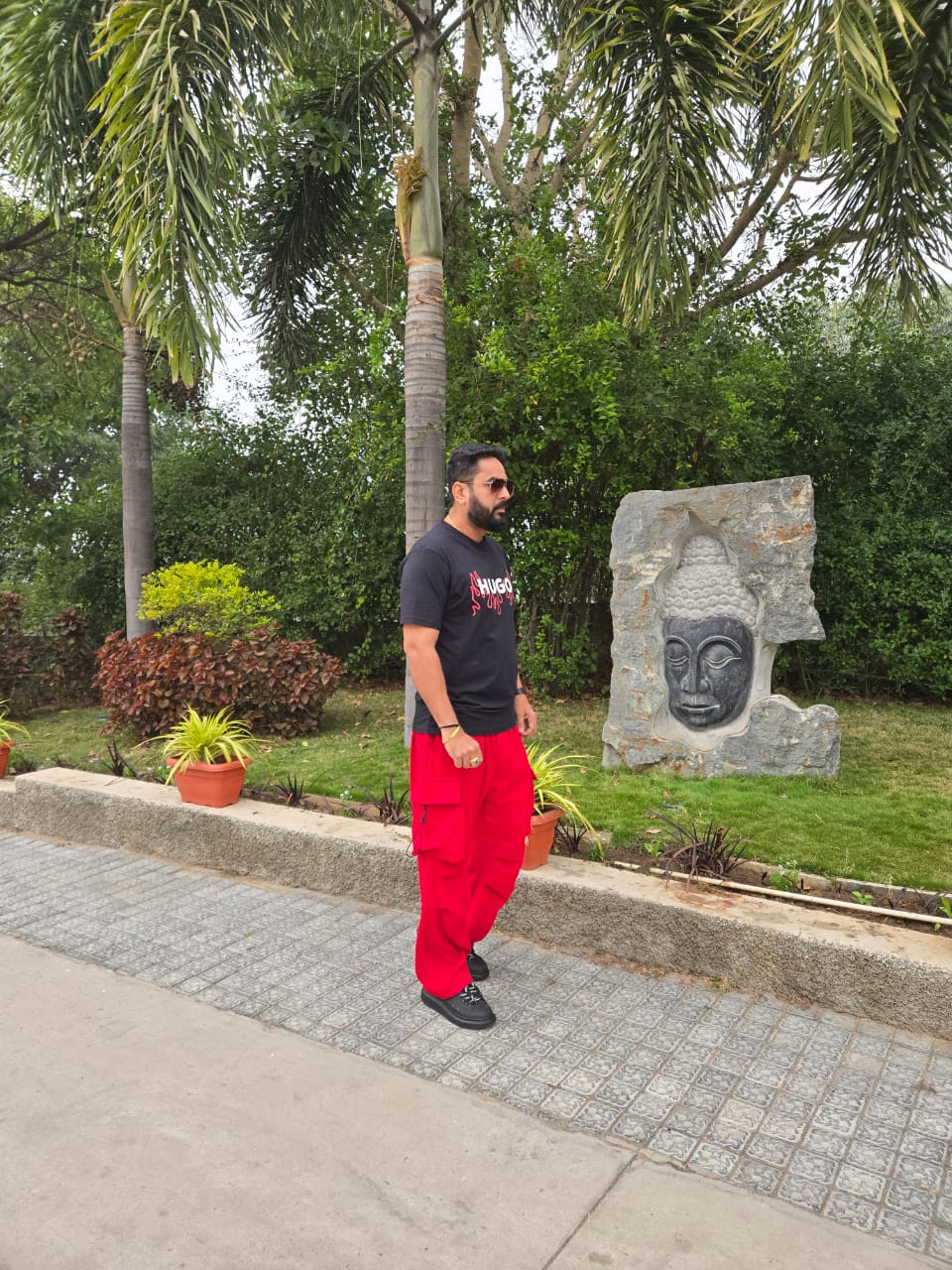 Raghu Bhat stylish casual look with red trousers