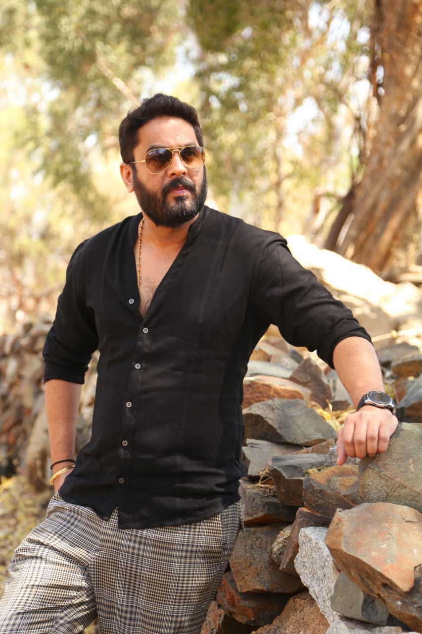 Raghu Bhat sunglasses rockstar style pose