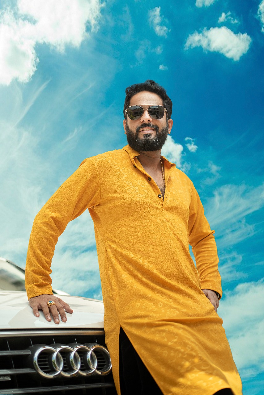 Raghu Bhat yellow kurta sunglasses stylish look