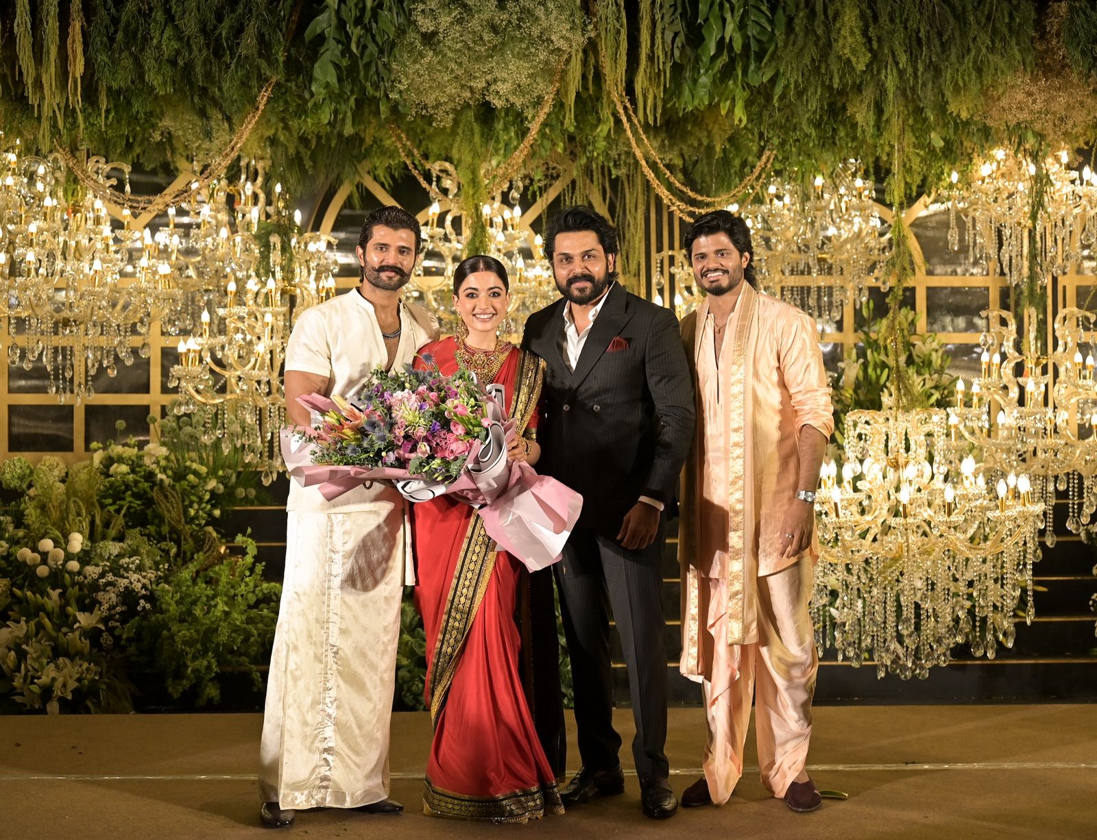 Karthi posing with Rashmika Mandanna Vijay Deverakonda reception
