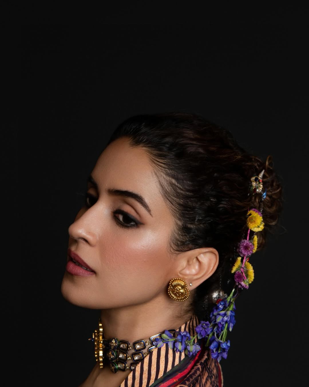 Sanya Malhotra wearing floral accent elegant outfit