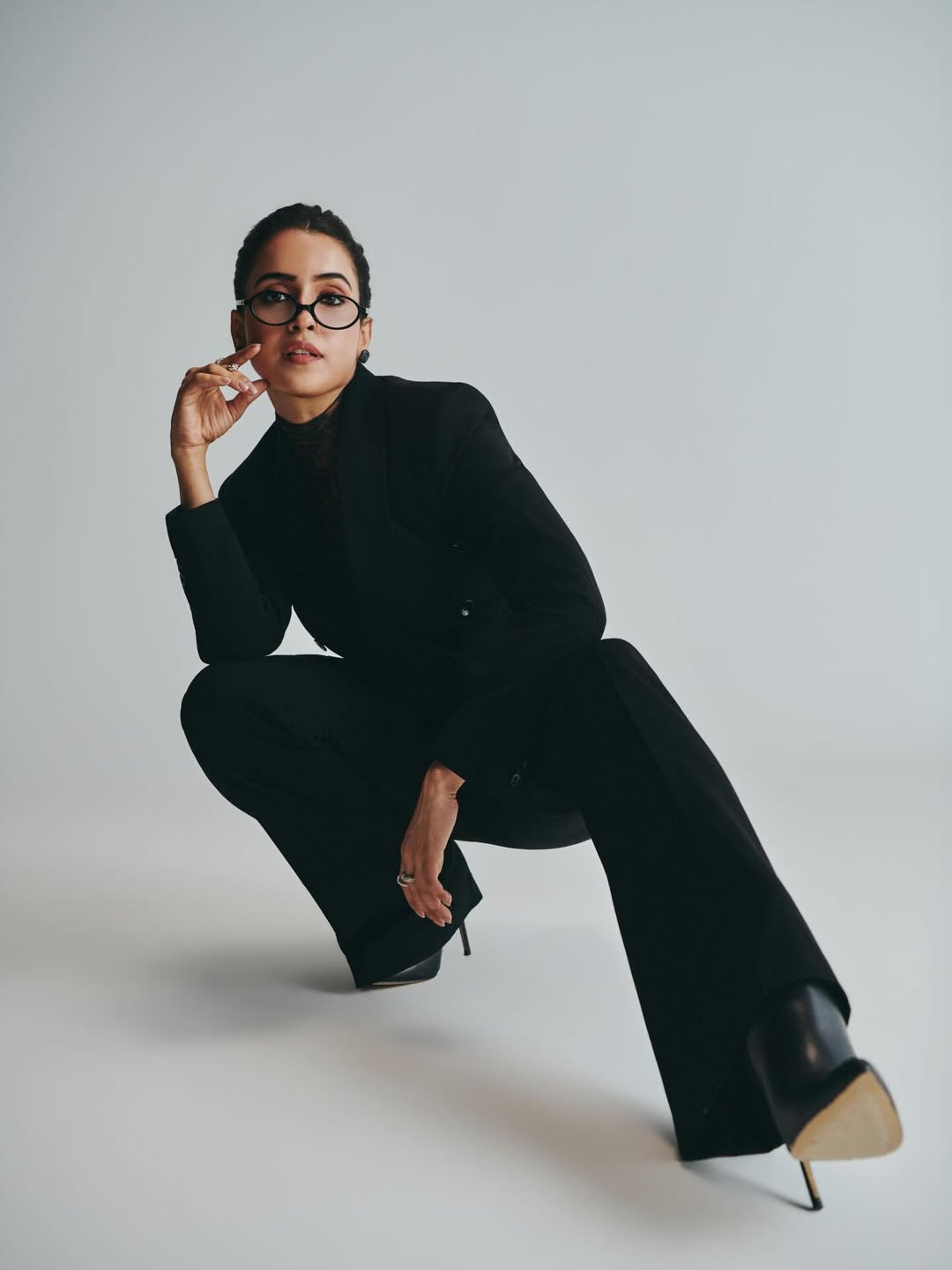 Sanya Malhotra stylish black power suit confident pose